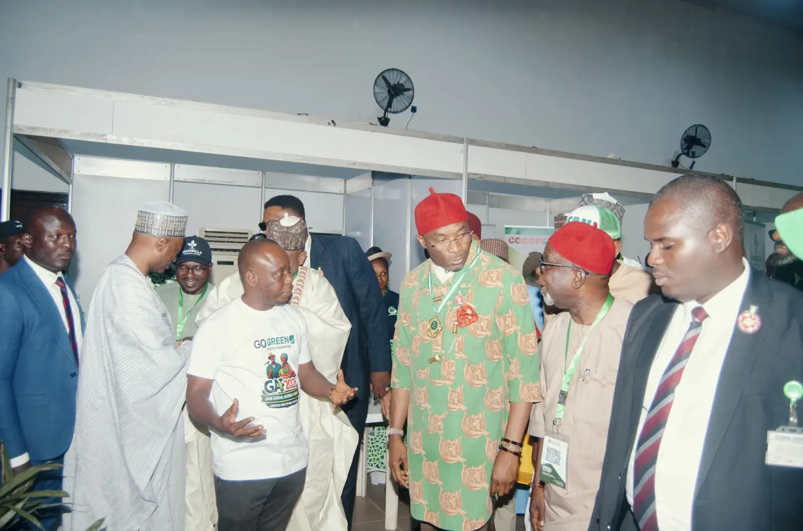 Foundation representatives in conversation with officials at an exhibition stand